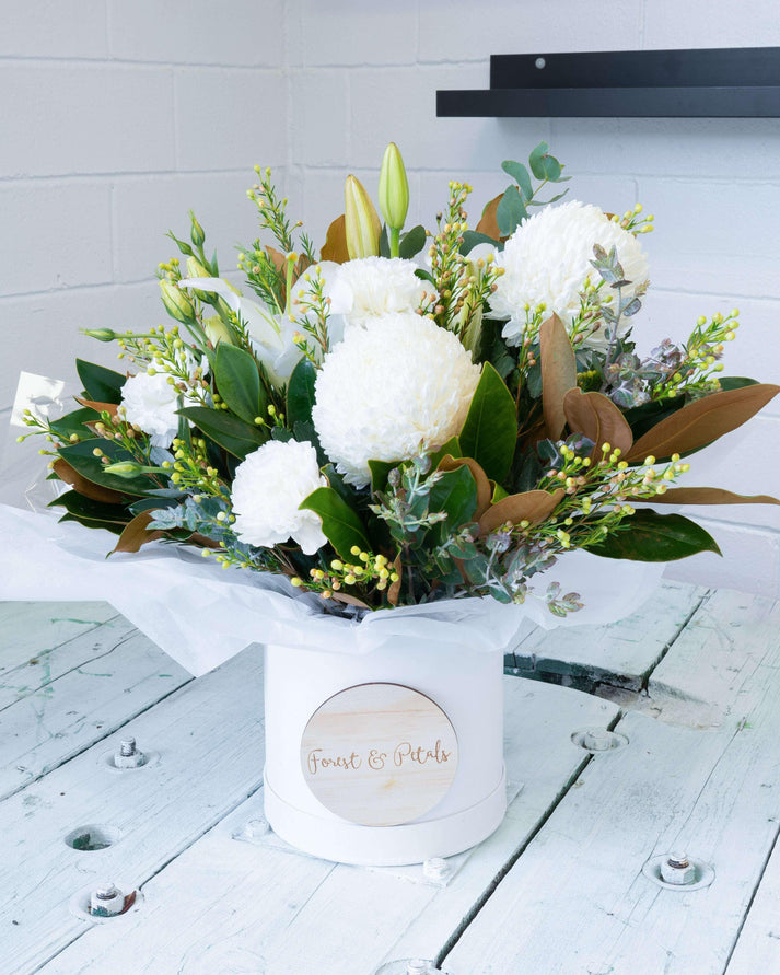 Dancing in the Sky Sympathy boxed arrangement Same day delivery